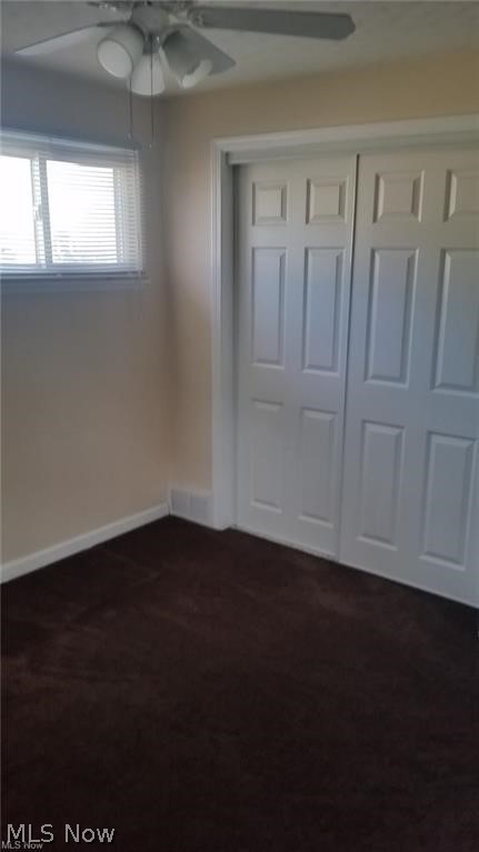 4050 Fulton Road Cleveland, OH 44144 - Photo 15 of 19 Carpeted bedroom with ceiling fan and closet.