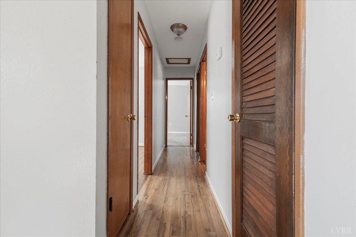 813 Doss Road Concord, VA 24538 - Photo 17 of 31 a view of a hallway with wooden floor