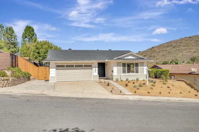 a kitchen with a stove and a sink