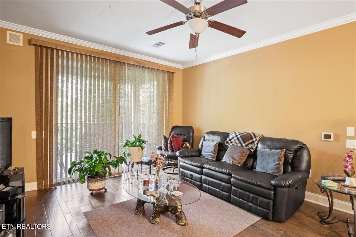 315 Centennial Bluff Boulevard Oak Ridge, TN 37830 - Photo 11 of 24 a living room with furniture and a large window