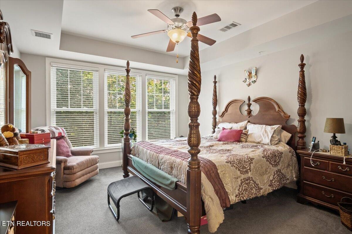 315 Centennial Bluff Boulevard Oak Ridge, TN 37830 - Photo 13 of 24 a bedroom with a bed couch and window