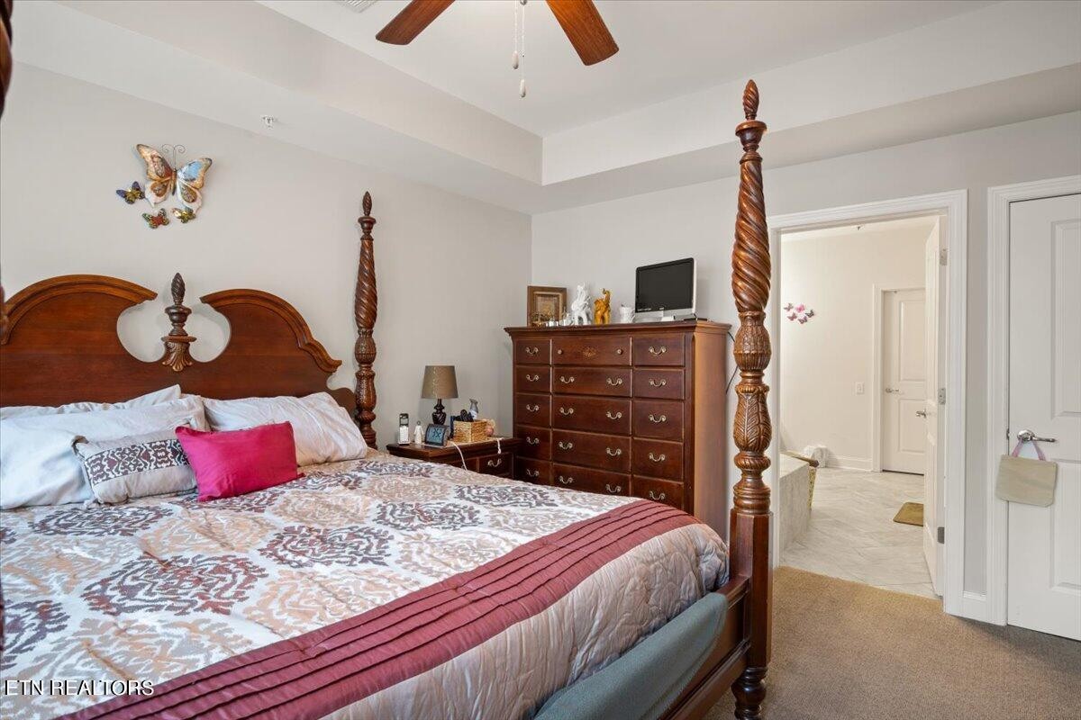 315 Centennial Bluff Boulevard Oak Ridge, TN 37830 - Photo 14 of 24 a bedroom with a bed and wooden floor