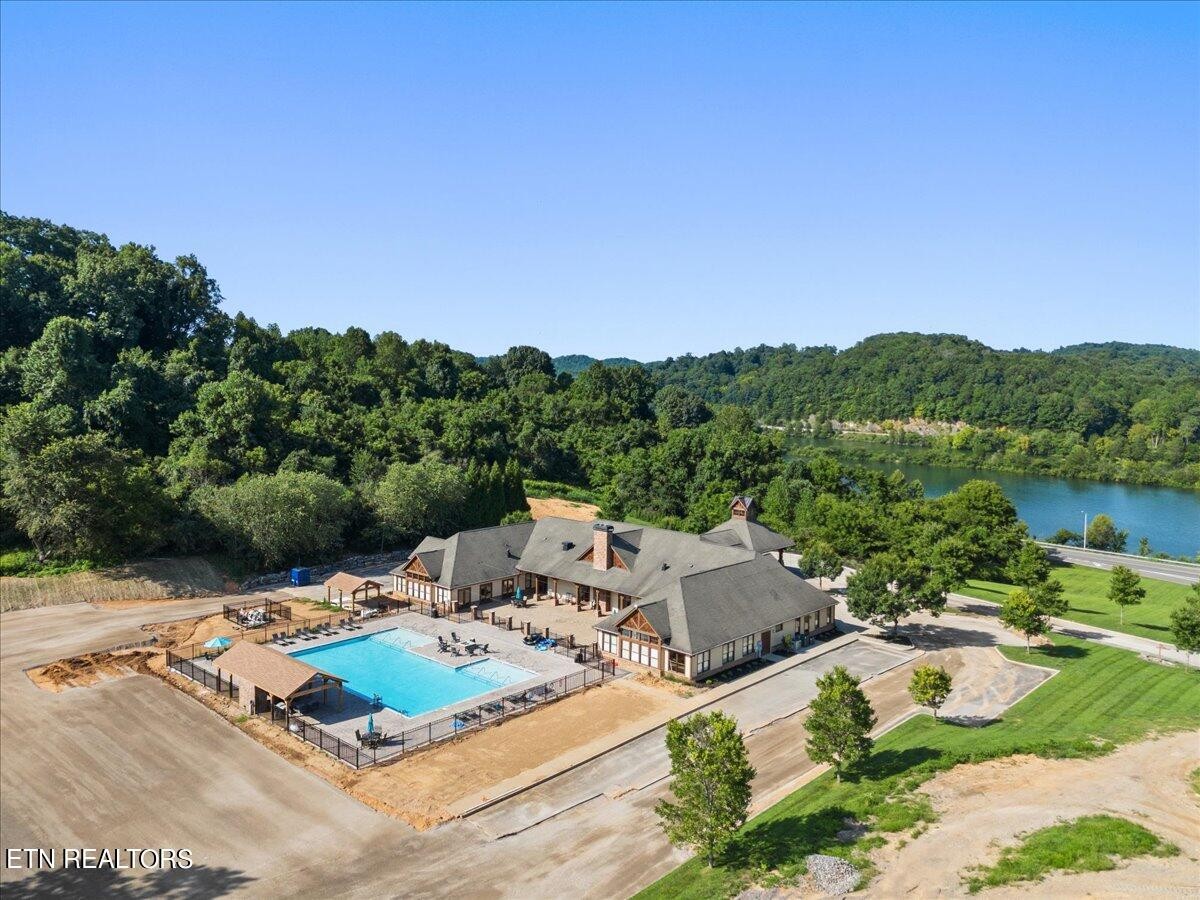315 Centennial Bluff Boulevard Oak Ridge, TN 37830 - Photo 24 of 24 a view of a house with pool and a yard