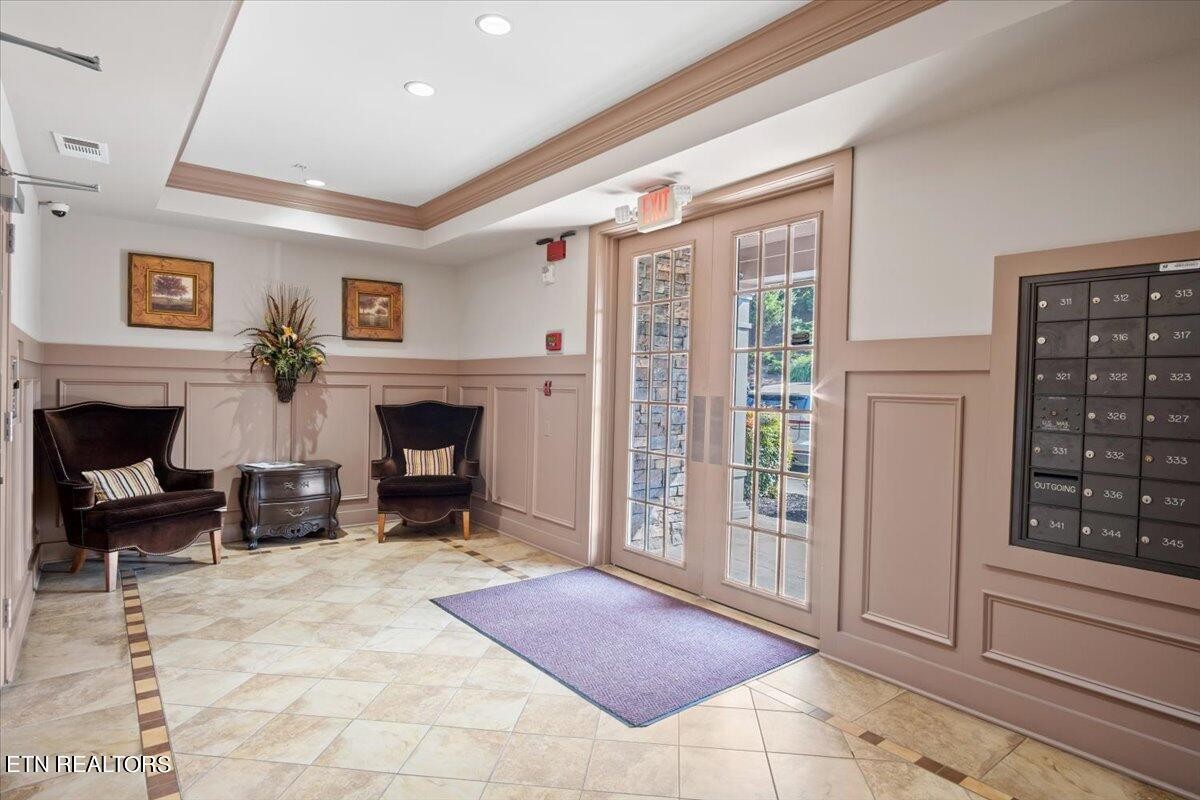 315 Centennial Bluff Boulevard Oak Ridge, TN 37830 - Photo 5 of 24 a living room with furniture a fireplace and a large window