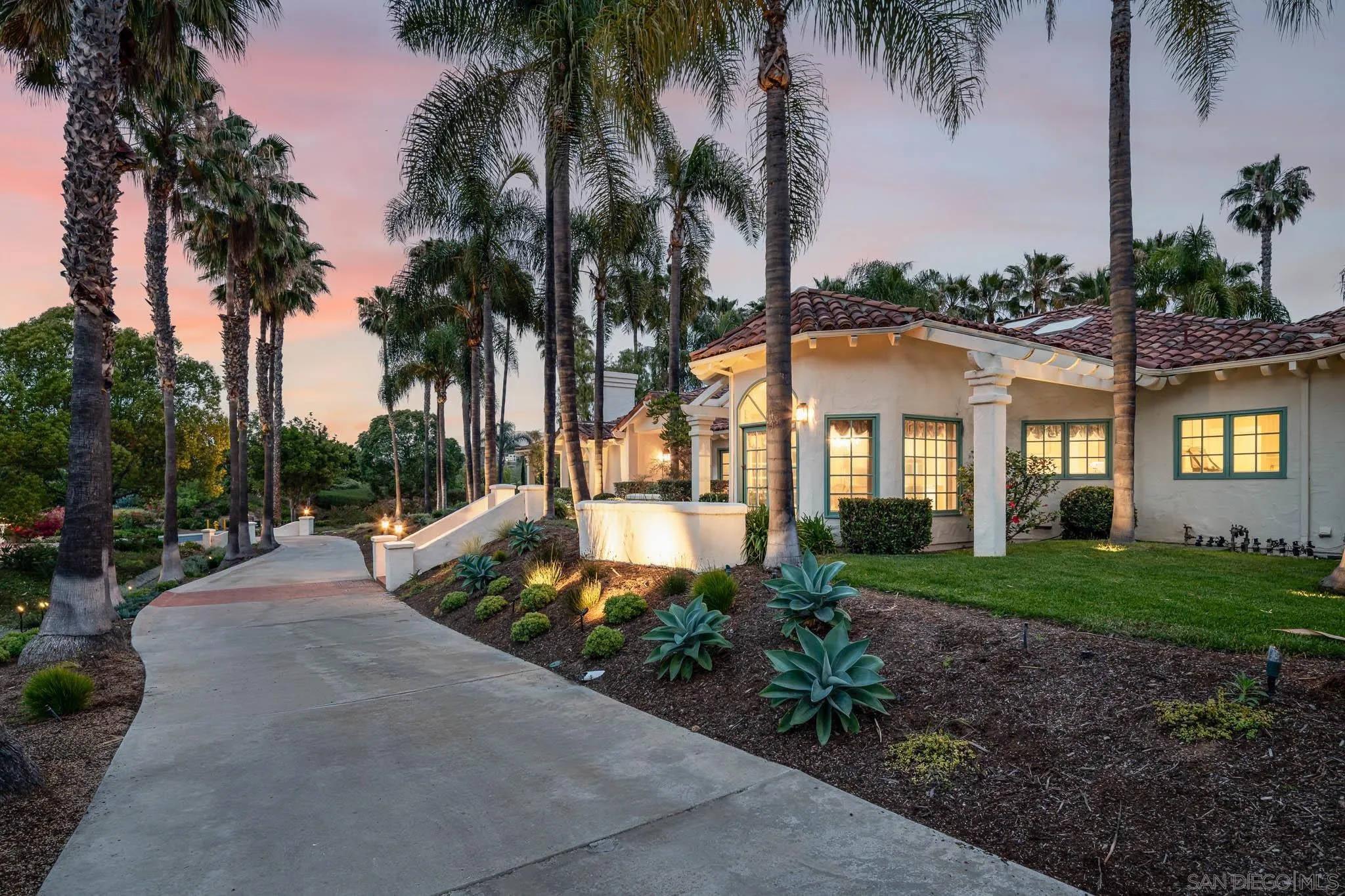 18221 Via Ascenso Rancho Santa Fe, CA 92067 - Photo 4 of 37 a view of a house with a yard and palm trees