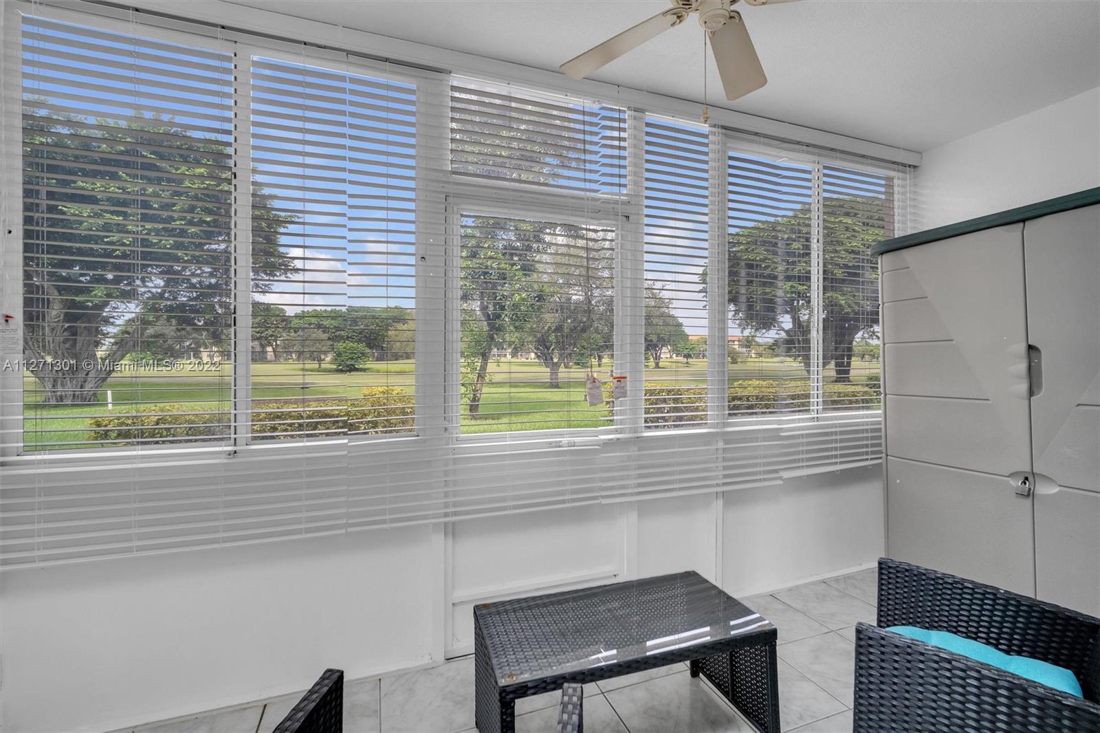 300 Southwest 130th Terrace, Unit 106B Pembroke Pines, FL 33027 - Photo 12 of 43 a kitchen with a window and a sink