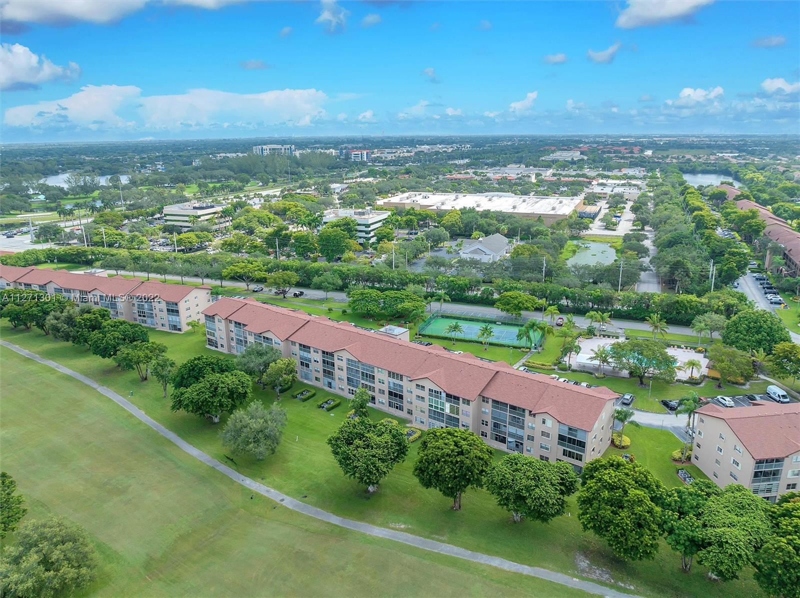 300 Southwest 130th Terrace, Unit 106B Pembroke Pines, FL 33027 - Photo 38 of 43 a view of a city with an ocean