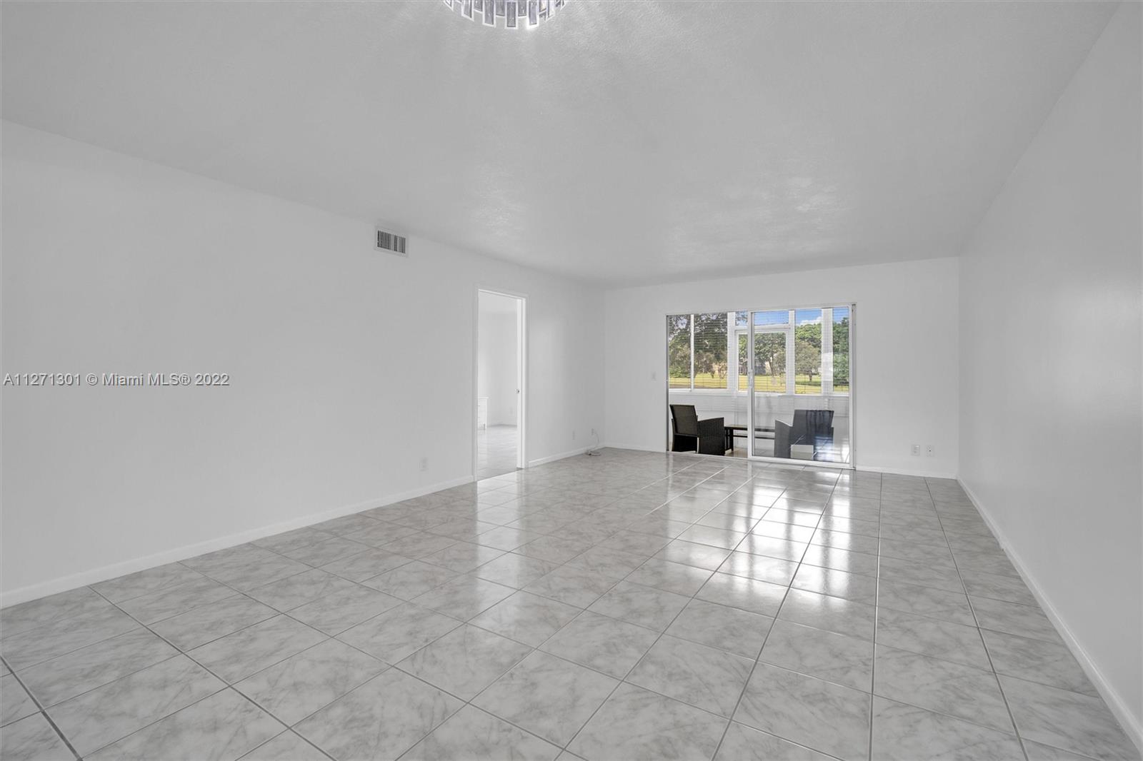 300 Southwest 130th Terrace, Unit 106B Pembroke Pines, FL 33027 - Photo 8 of 43 a view of livingroom with furniture