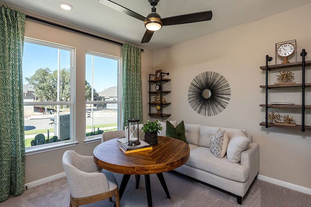 1212 Scenic Grn Loop Georgetown, TX 78628 - Photo 21 of 36 a living room with furniture and a large window
