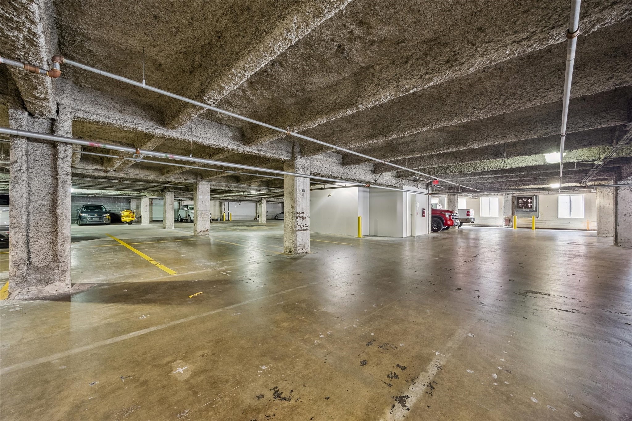 914 Main Street, Unit 910 Houston, TX 77002 - Photo 19 of 32 A huge plus in Downtown this unit comes with 2 Parking spaces.
