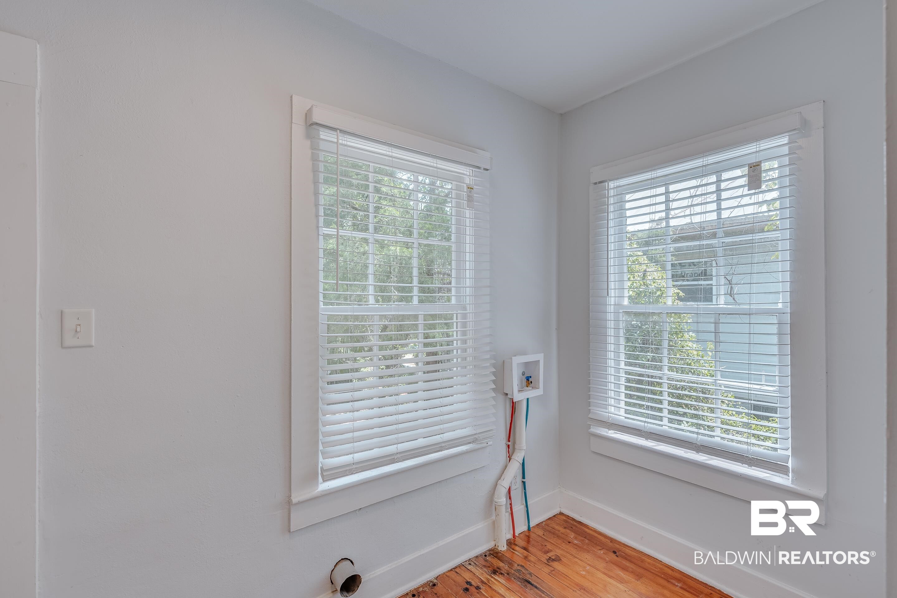 1852 Old Shell Road Mobile, AL 36607 - Photo 19 of 26 Detailed view of baseboards and wood finished floors