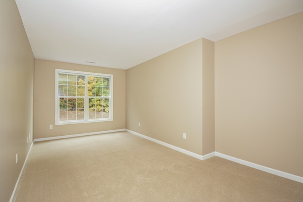 93 Brook Lane, Unit 93 Berlin, MA 01503 - Photo 18 of 29 an empty room with a window