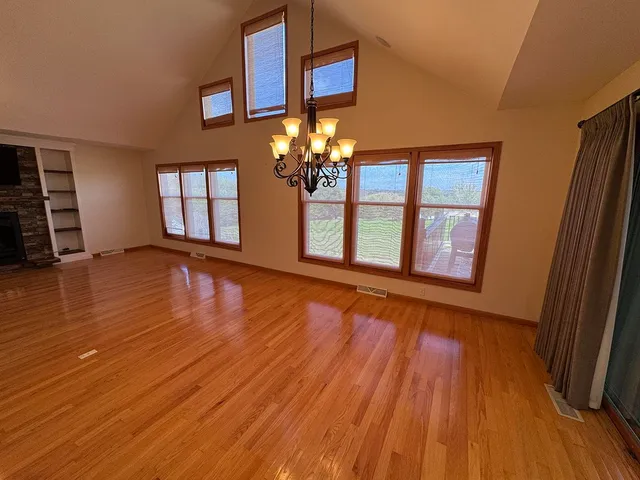 a bathroom with a tub sink and a mirror