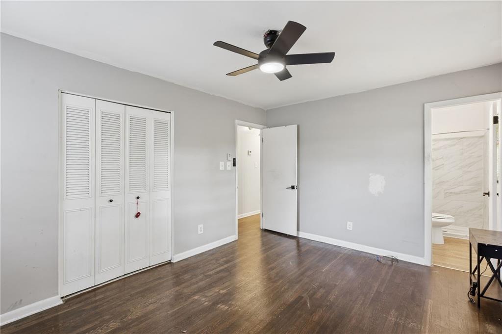 1739 Cardinal Road Hampton, GA 30228 - Photo 8 of 27 a view of a livingroom with a hardwood floor and a ceiling fan