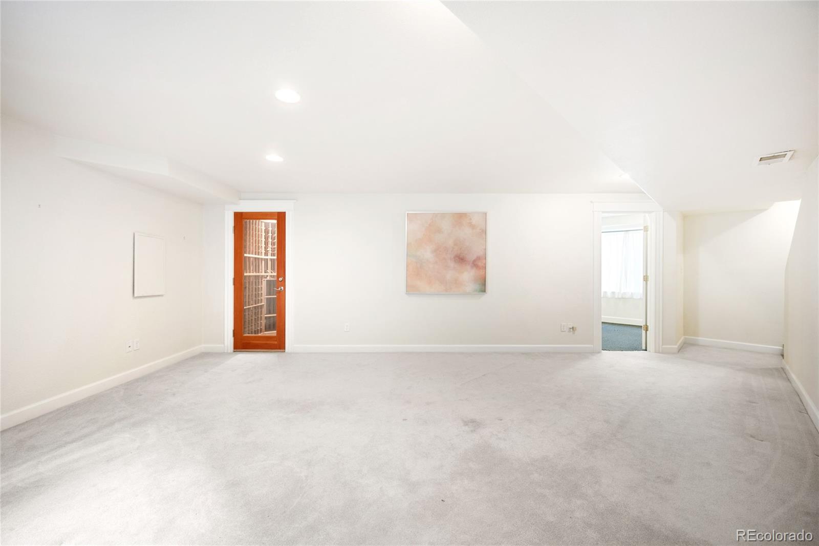 550 Madison Street Denver, CO 80206 - Photo 33 of 39 an empty room with windows