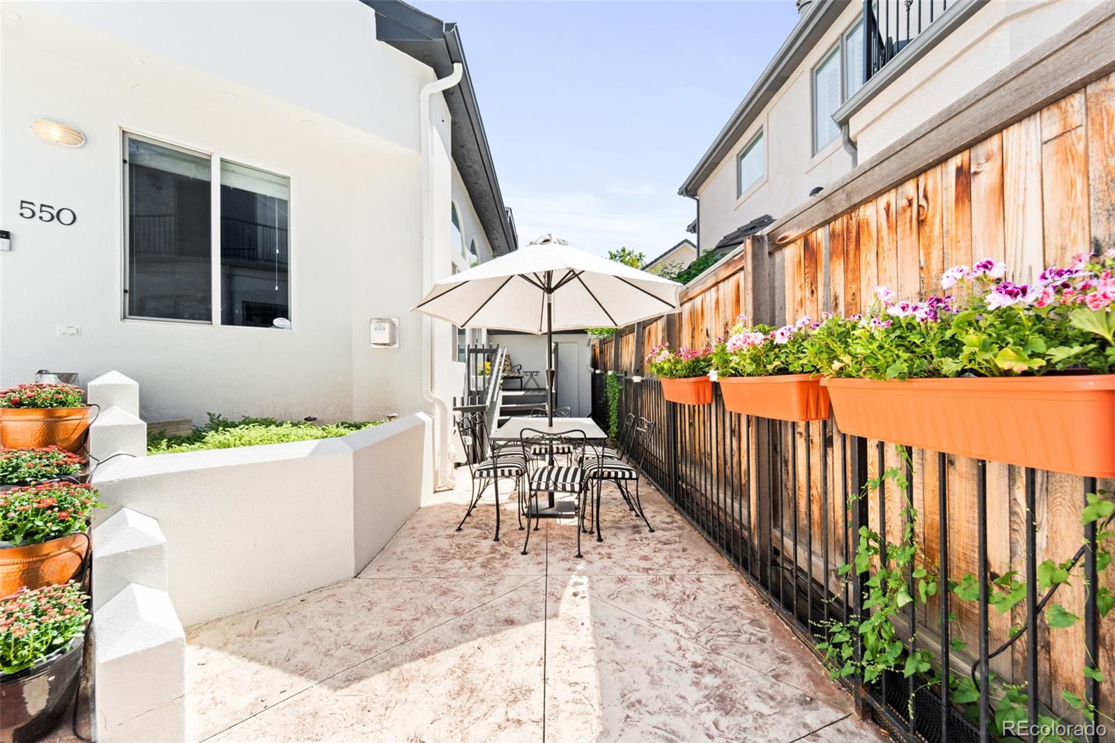 550 Madison Street Denver, CO 80206 - Photo 37 of 39 a view of a chair and tables in the balcony