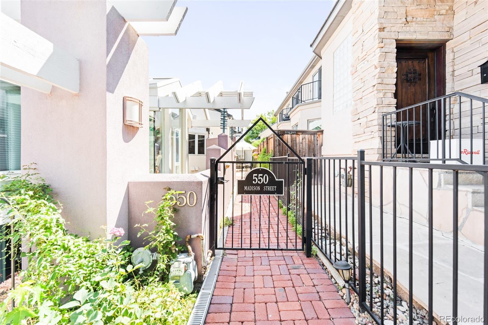 550 Madison Street Denver, CO 80206 - Photo 39 of 39 a view of a corridor and stairs