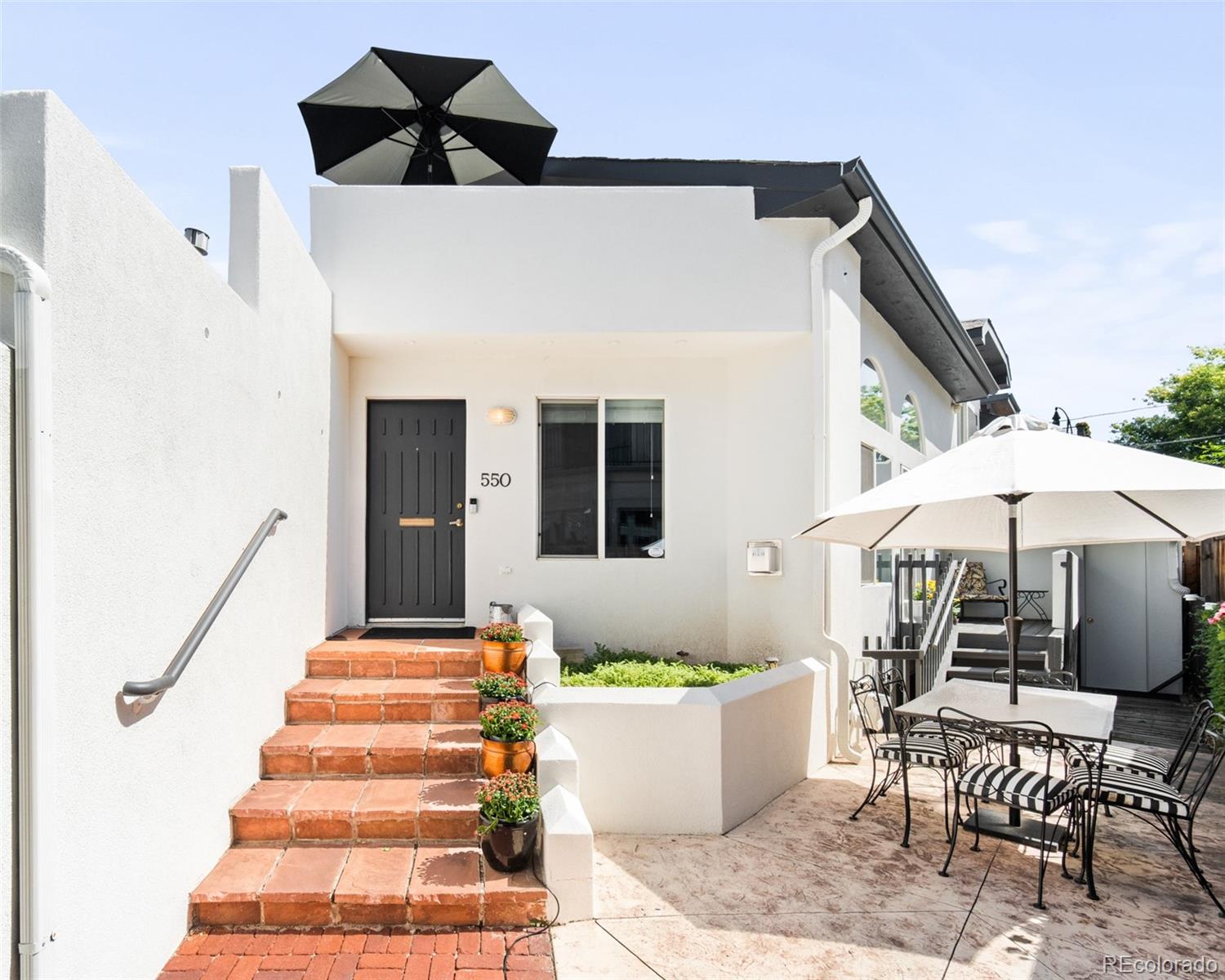 550 Madison Street Denver, CO 80206 - Photo 6 of 39 a view of entryway with furniture and wooden floor
