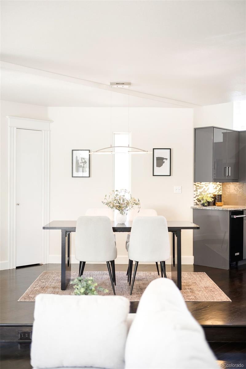 550 Madison Street Denver, CO 80206 - Photo 9 of 39 a living room with furniture and white walls