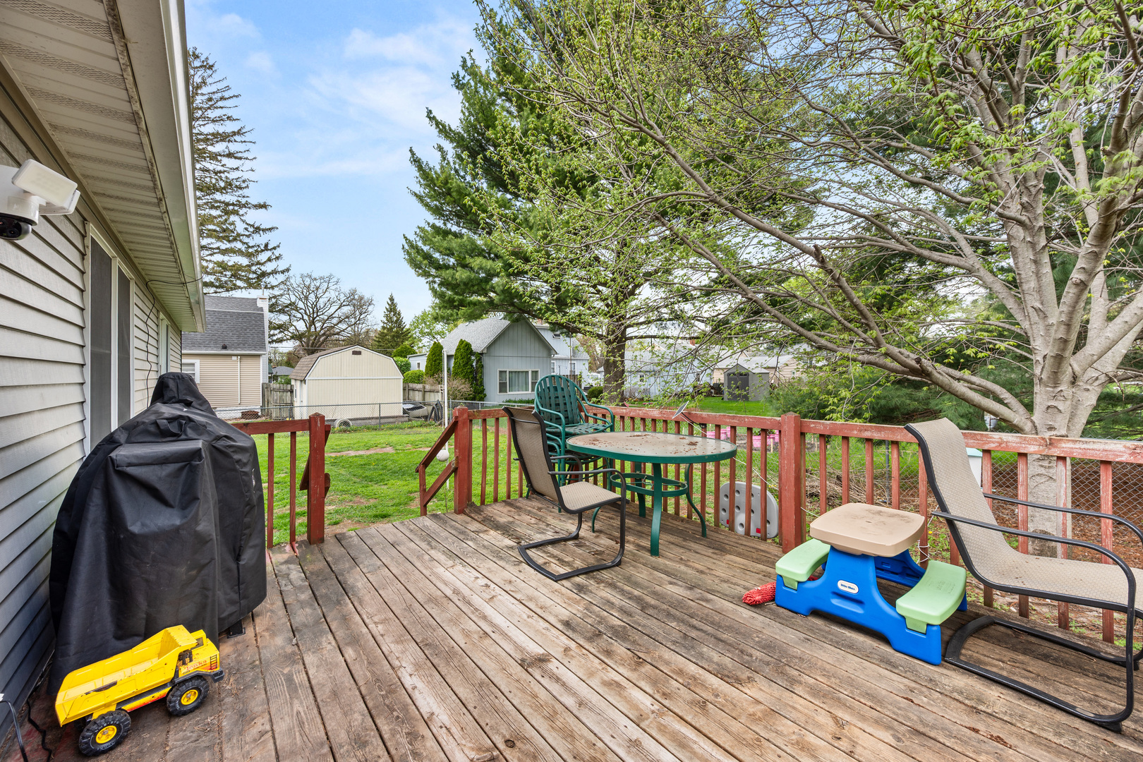 323 West Church Street Genoa, IL 60135 - Photo 20 of 28 a view of sitting area with swimming pool and furniture