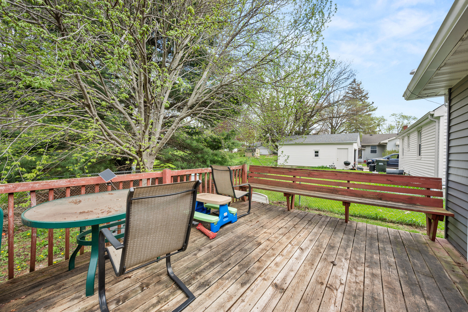 323 West Church Street Genoa, IL 60135 - Photo 21 of 28 a view of outdoor sitting area with furniture and wooden deck