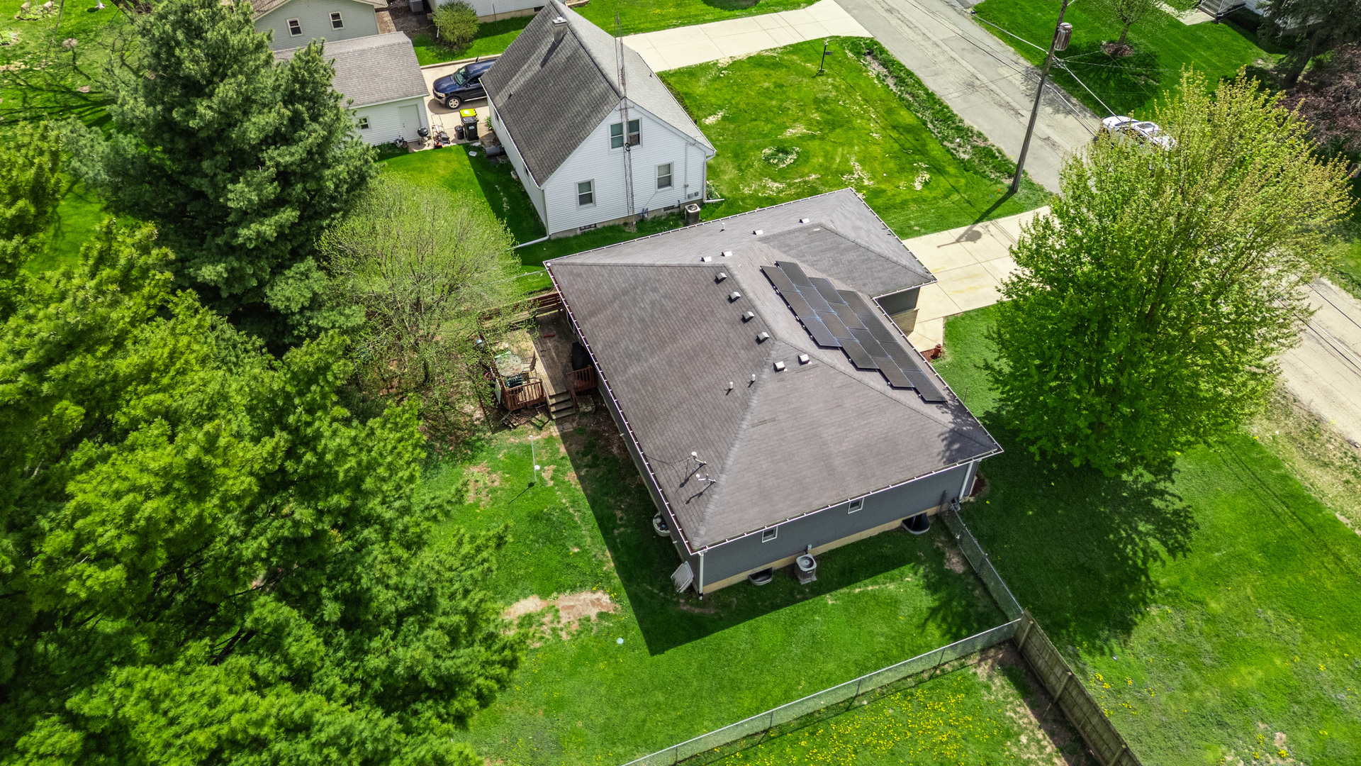 323 West Church Street Genoa, IL 60135 - Photo 25 of 28 an aerial view of a house with garden