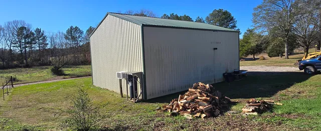 a backyard of a house with lots of green space