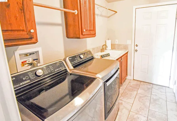 a kitchen with a stove and a microwave