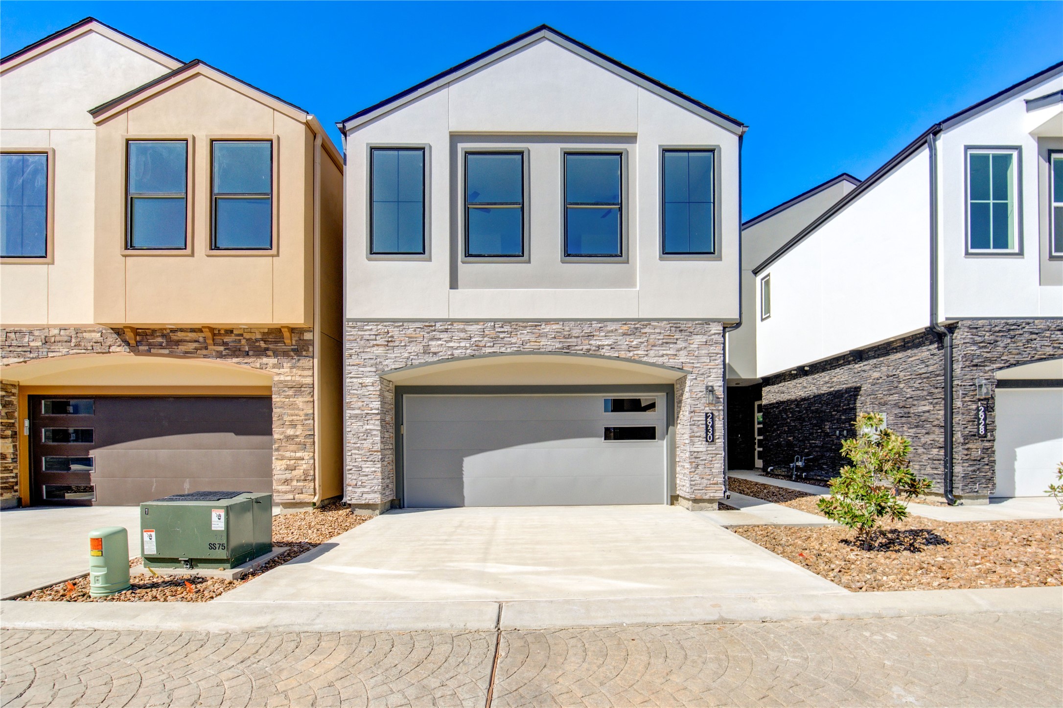 a front view of a house with yard