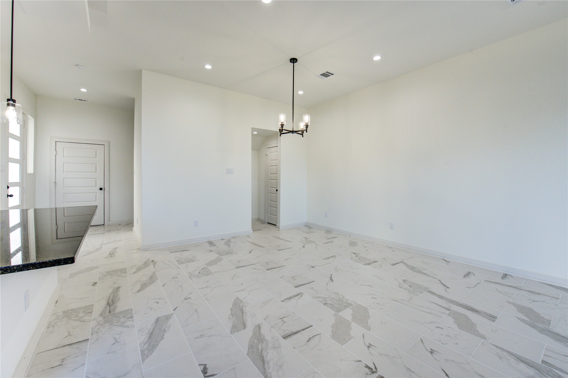 2930 El Fenice Lane Houston, TX 77057 - Photo 11 of 37 a view of a room with a chandelier