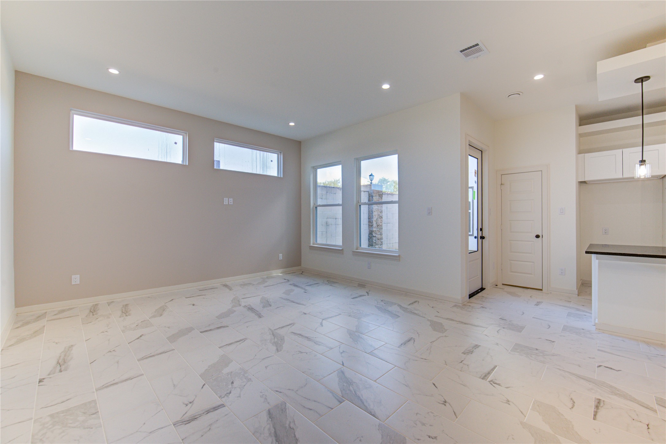 2930 El Fenice Lane Houston, TX 77057 - Photo 13 of 37 a view of an empty room with a kitchen