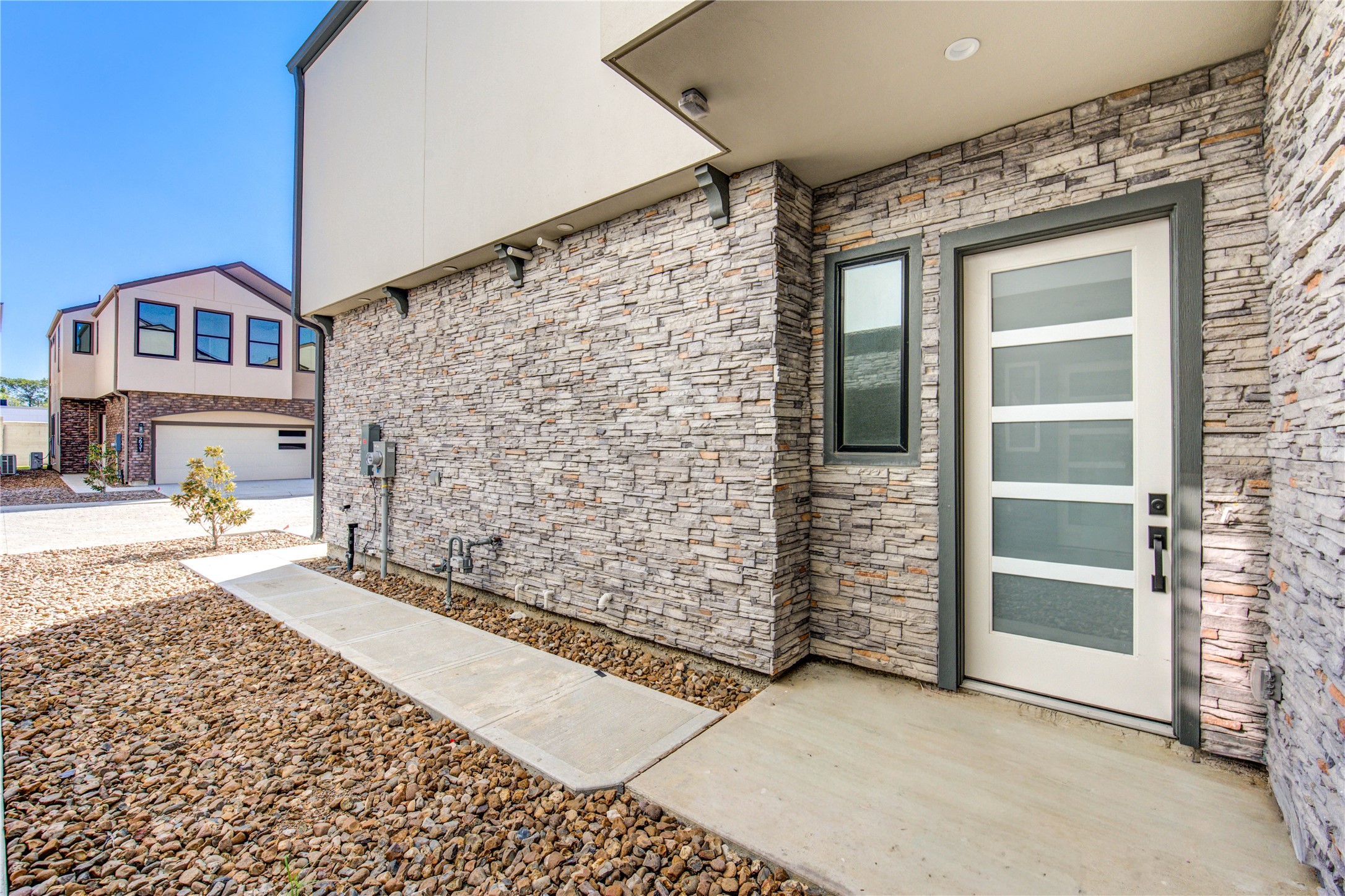 2930 El Fenice Lane Houston, TX 77057 - Photo 2 of 37 a view of a brick house with an outdoor space