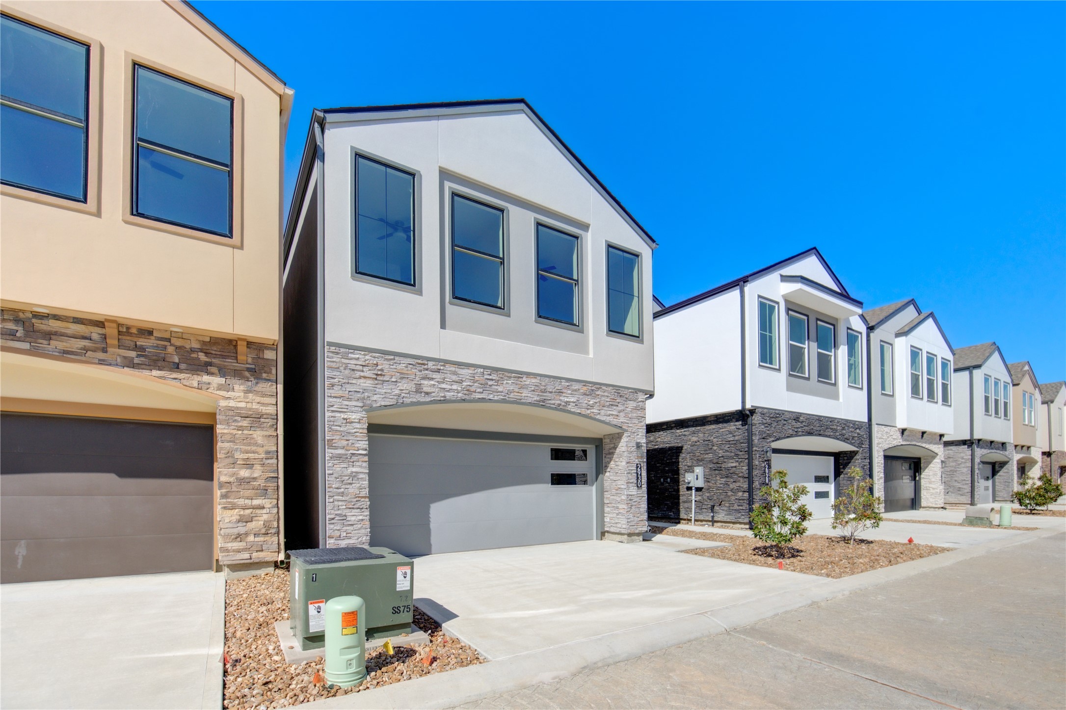 2930 El Fenice Lane Houston, TX 77057 - Photo 4 of 37 a front view of a building with street