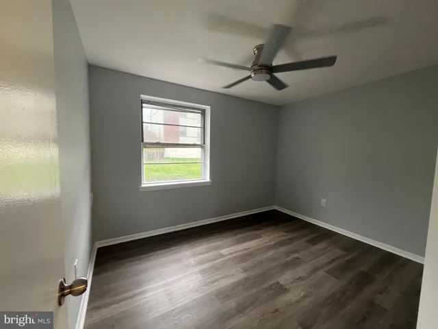 a view of a street with cars