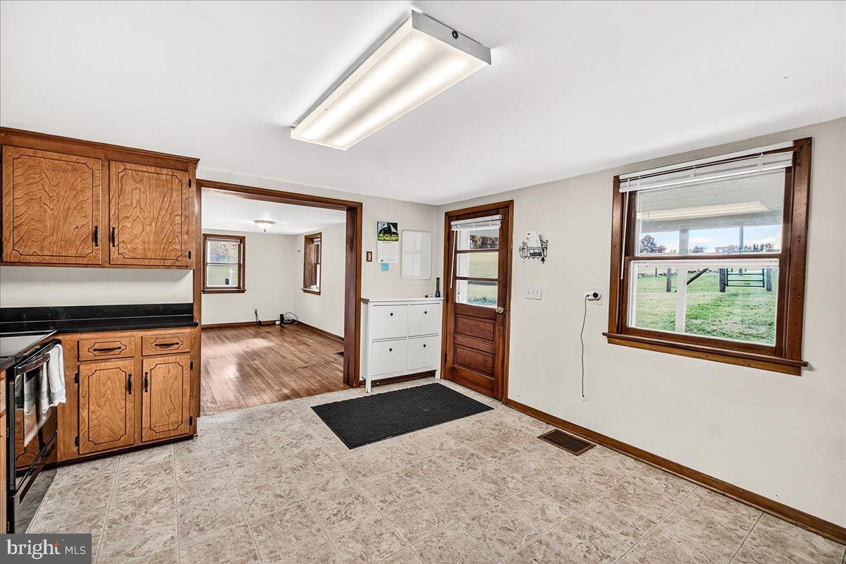11804 Pleasant Walk Road Myersville, MD 21773 - Photo 14 of 49 an entryway with cabinet and a window