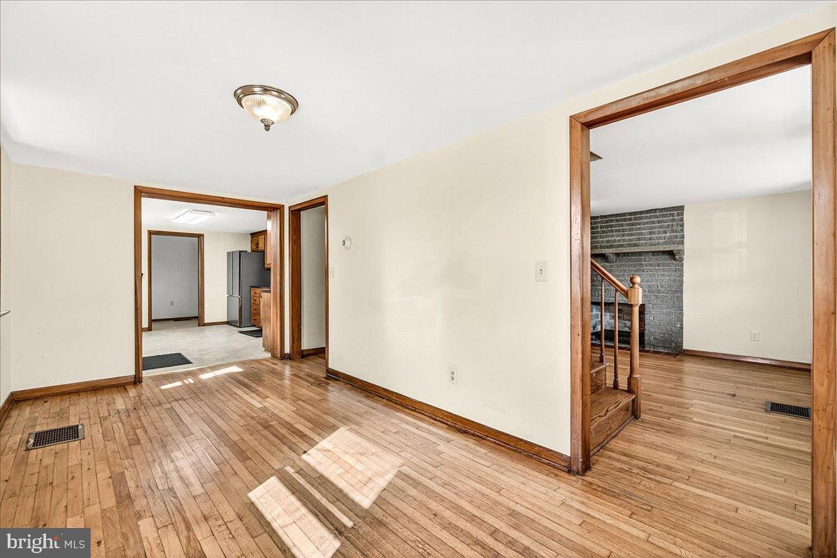 11804 Pleasant Walk Road Myersville, MD 21773 - Photo 19 of 49 a view of a room with wooden floor