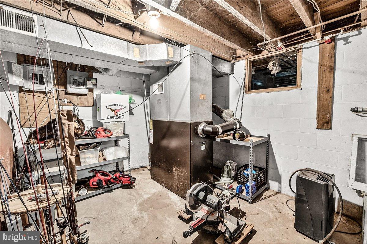 11804 Pleasant Walk Road Myersville, MD 21773 - Photo 25 of 49 a view of a storage room with washer and dryer