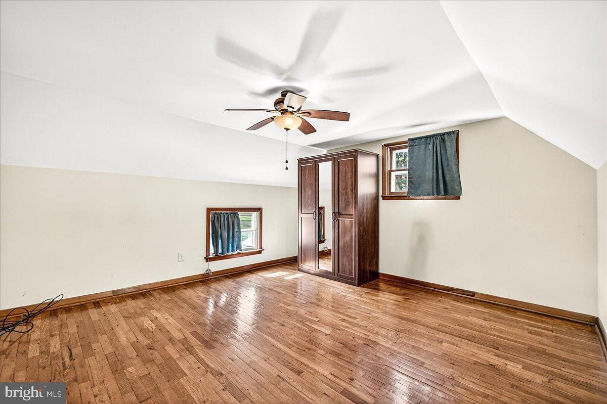 11804 Pleasant Walk Road Myersville, MD 21773 - Photo 26 of 49 wooden floor in an empty room with a window