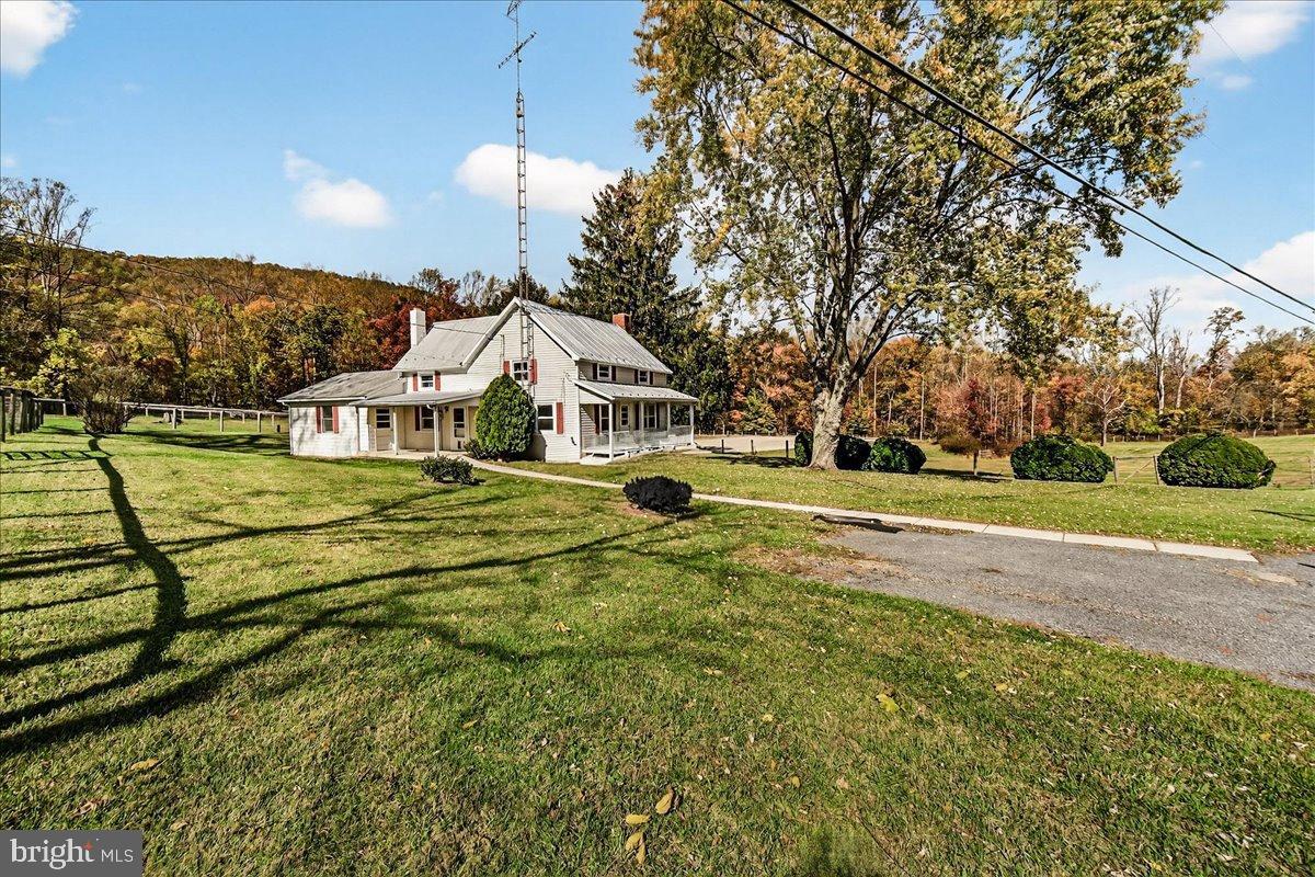 11804 Pleasant Walk Road Myersville, MD 21773 - Photo 6 of 49 a view of a house with a yard