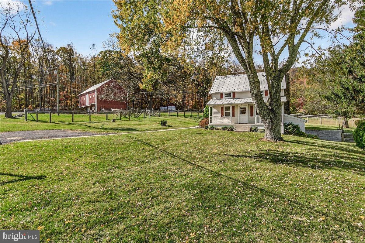 11804 Pleasant Walk Road Myersville, MD 21773 - Photo 8 of 49 a view of a house with a yard