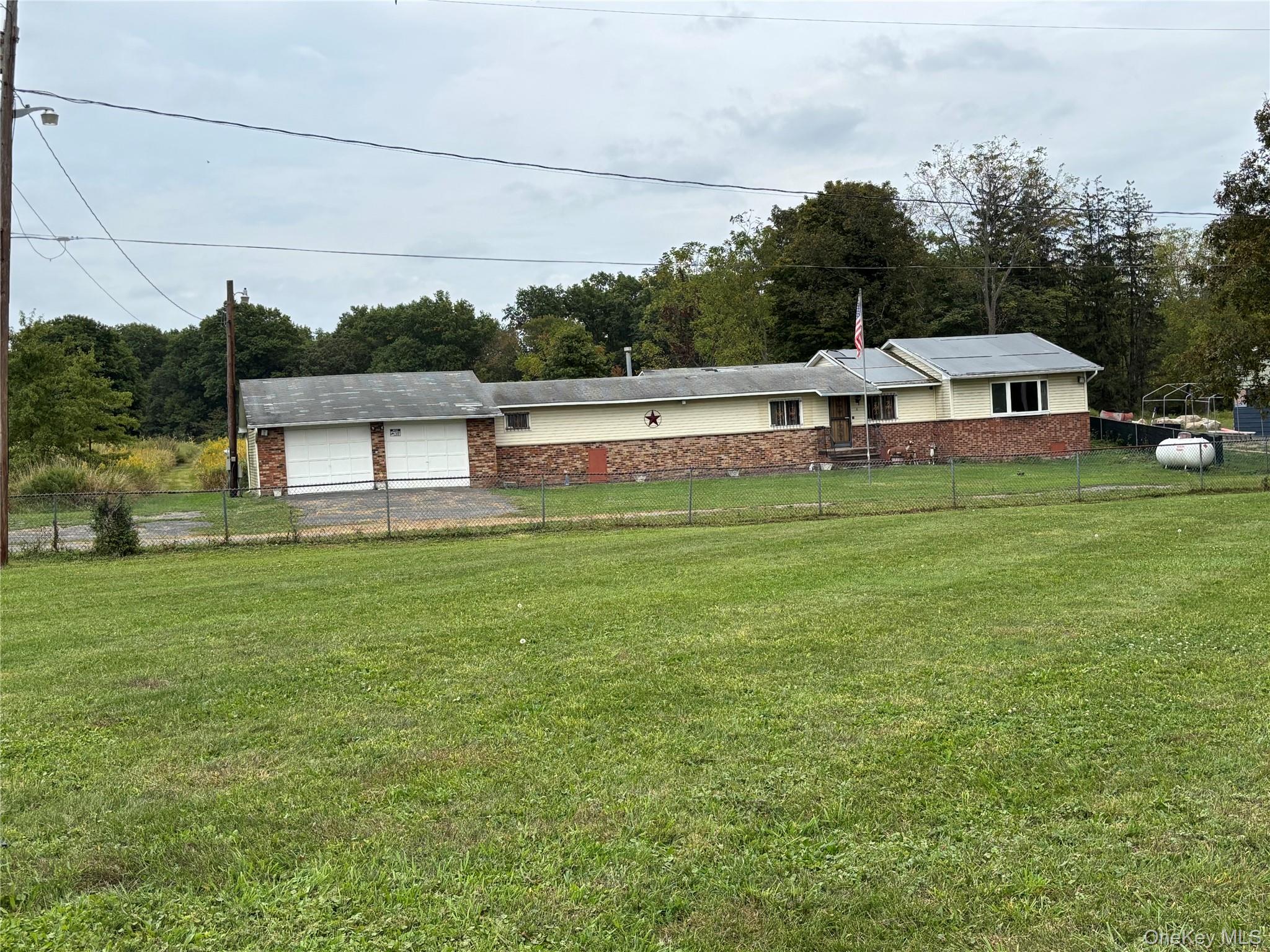 6 Milo Road New Hampton, NY 10958 - Photo 1 of 1 a view of a house with a yard and sitting area
