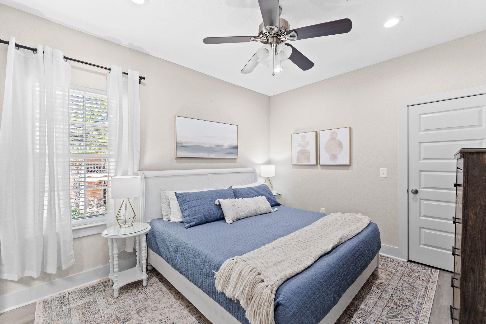 22 Mobile Street Miramar Beach, FL 32550 - Photo 31 of 55 a bedroom with a large bed and a window