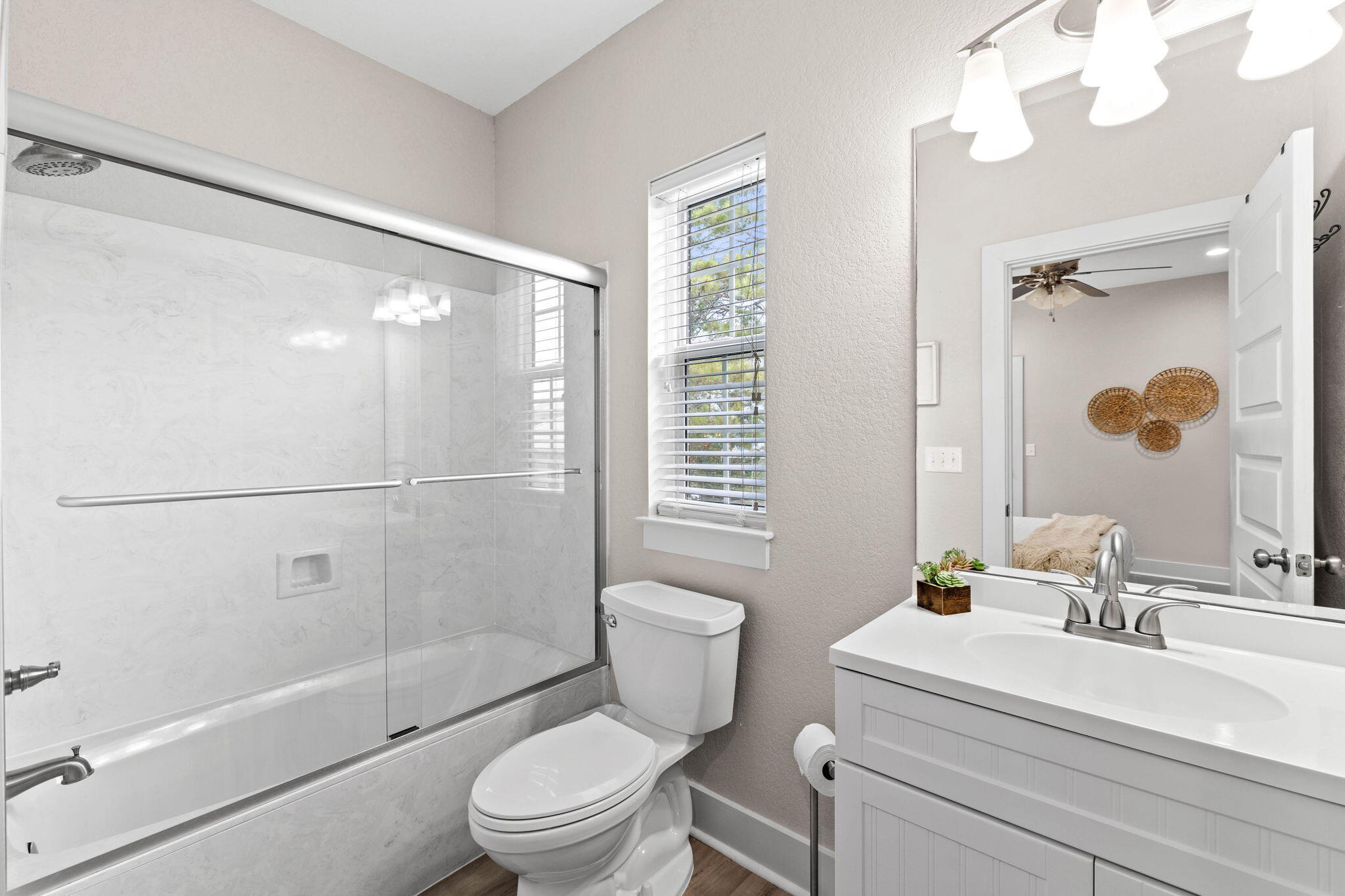 22 Mobile Street Miramar Beach, FL 32550 - Photo 36 of 55 a bathroom with a sink a toilet and shower