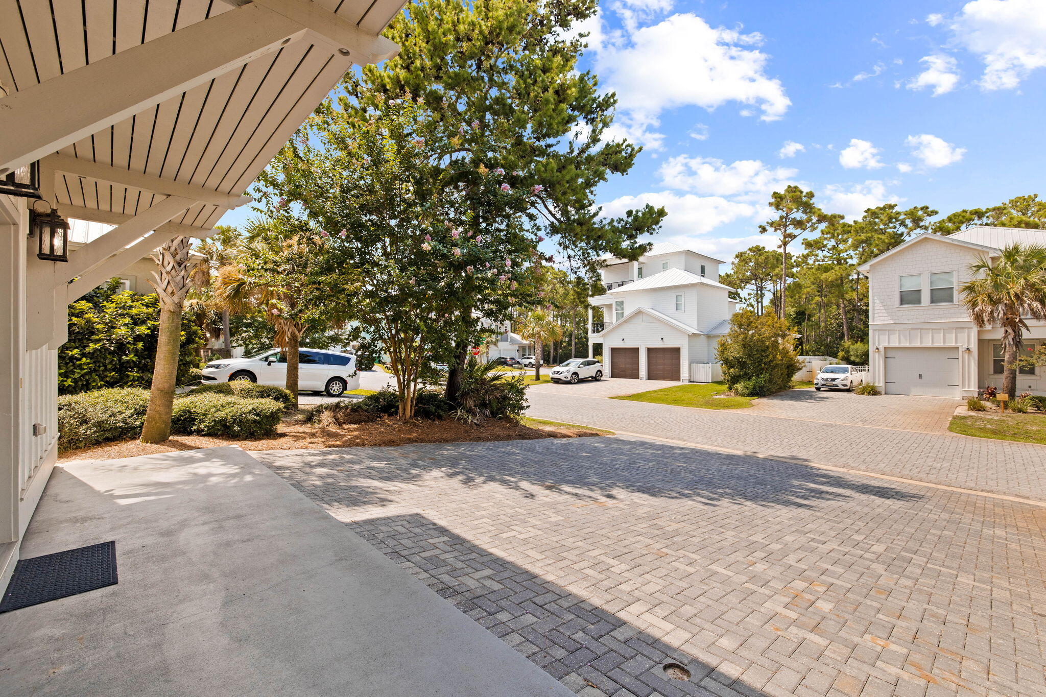 22 Mobile Street Miramar Beach, FL 32550 - Photo 6 of 55 a view of a white house with a large tree in front of it