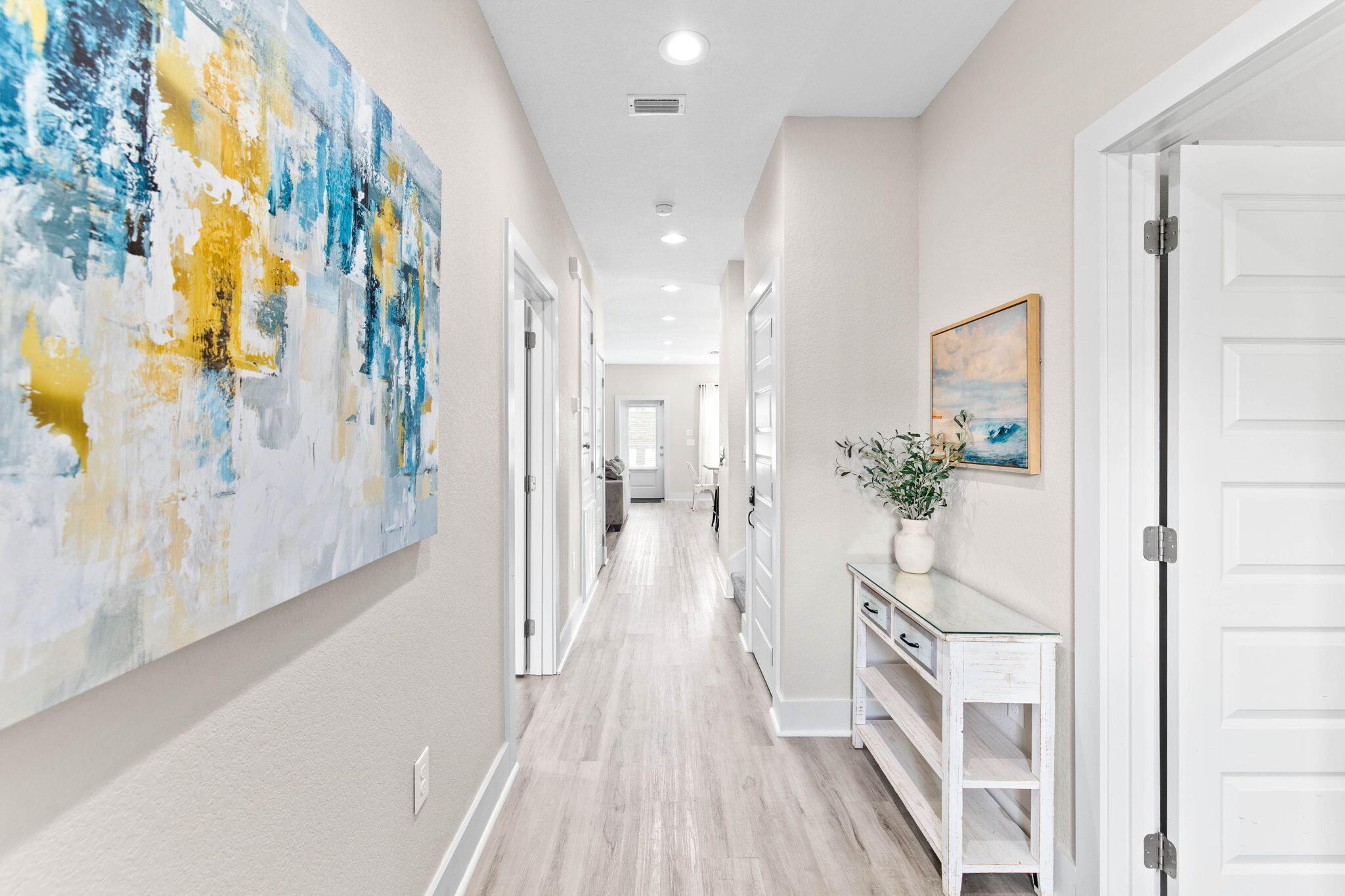 22 Mobile Street Miramar Beach, FL 32550 - Photo 9 of 55 a view of a hallway with wooden floor and staircase
