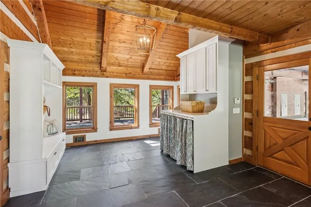 a view of an entryway with front door