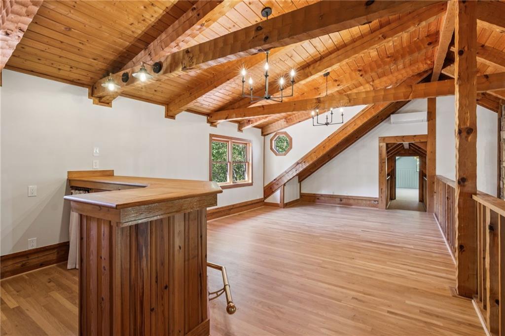 2905 Cammie Wages Road Dacula, GA 30019 - Photo 30 of 55 a storage room with wooden floor