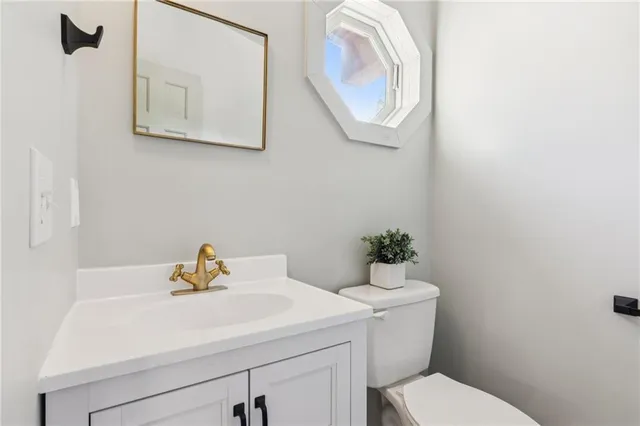 a view of a wooden deck with a yard