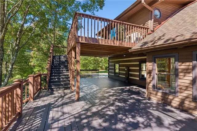an aerial view of a forest with houses