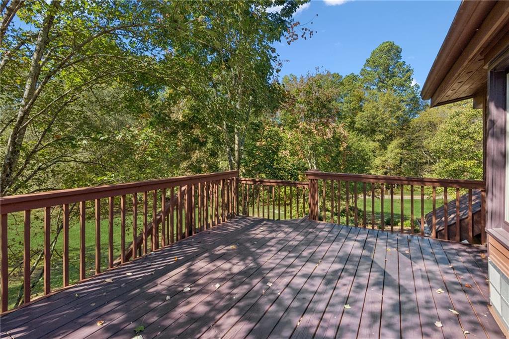 2905 Cammie Wages Road Dacula, GA 30019 - Photo 53 of 55 a balcony with trees in front of it